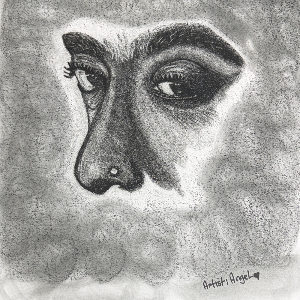 Angel's Charcoal Portrait with Black and Gray Hues